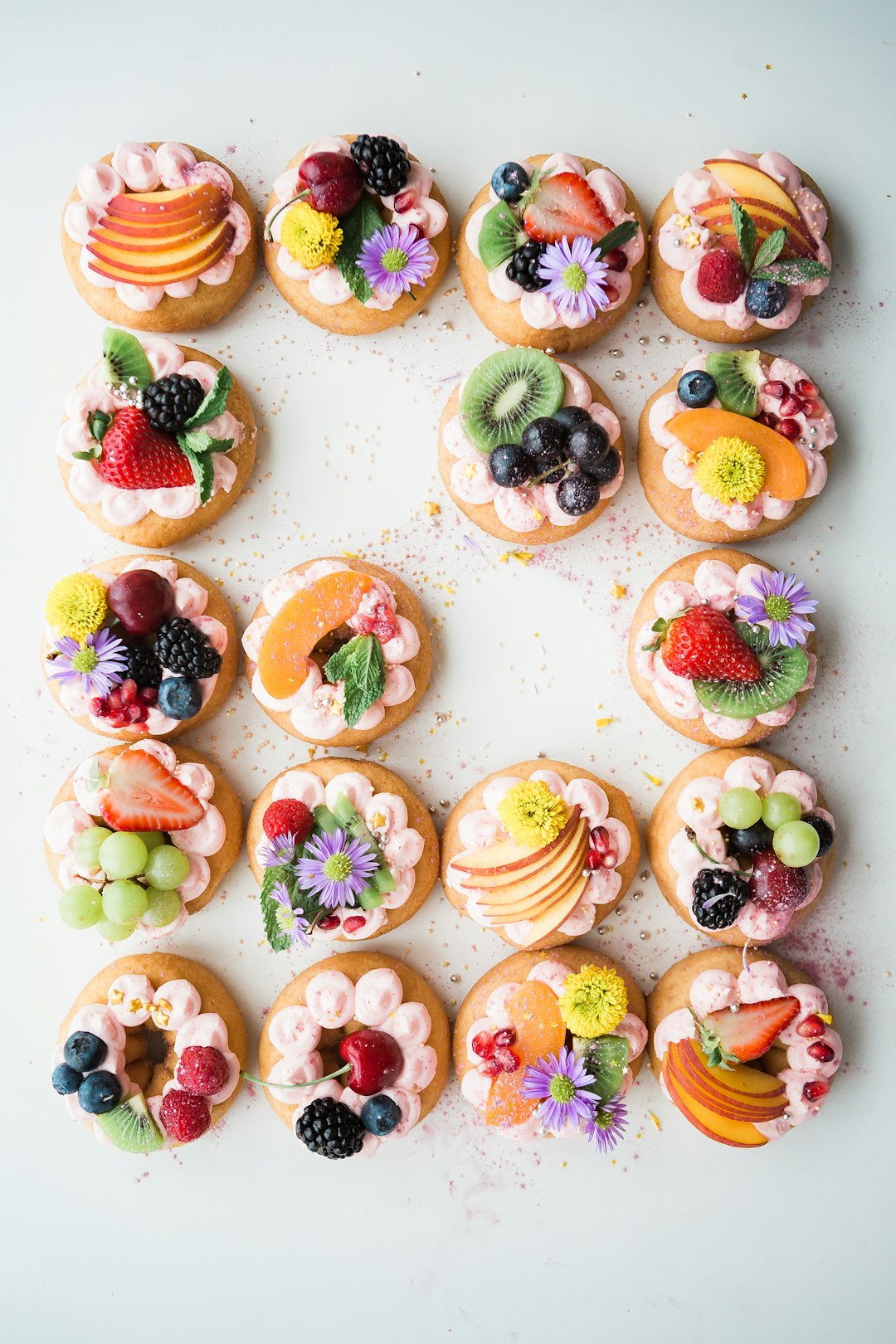 Offerings Donuts halo’ed with fruits and flowers. Whatever could be better?